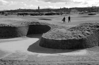 St Andrews Old Course. Hell bunker. Golfers. Black and white