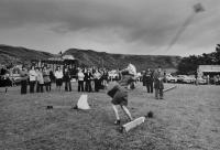 Woman tossing the broom, Dunbeath Highland Games