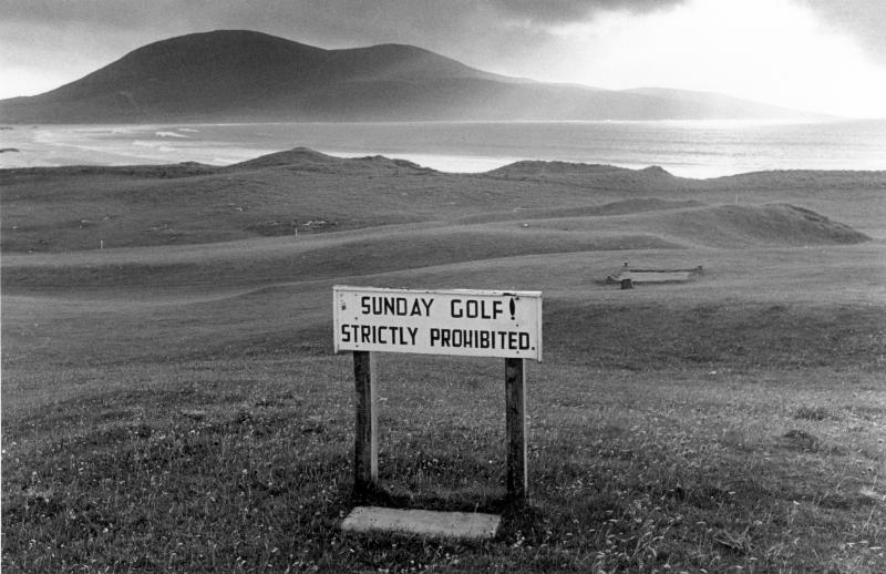 Harris golf course. No Sunday golf sign. Black and white
