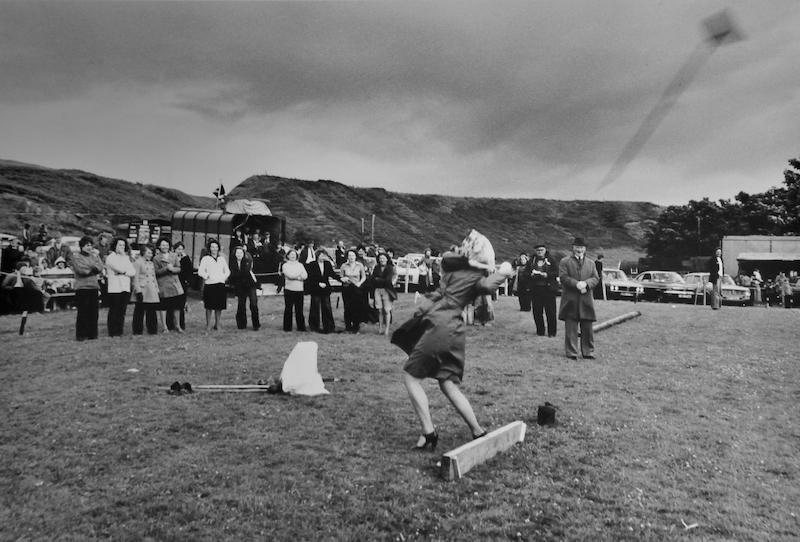Woman tossing the broom, Dunbeath Highland Games